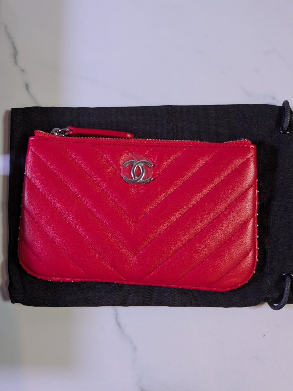 CHANEL Mini O-Case Zip Pouch — Red Chevron Quilted Lambskin, Studded Trim
